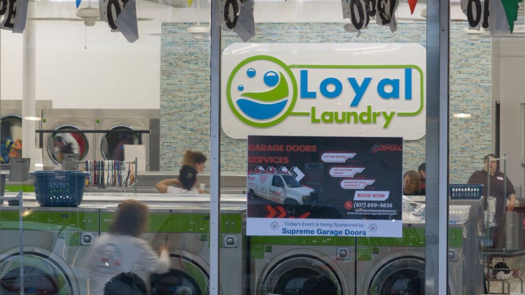 Loyal Laundry and Supreme Garage Door signage